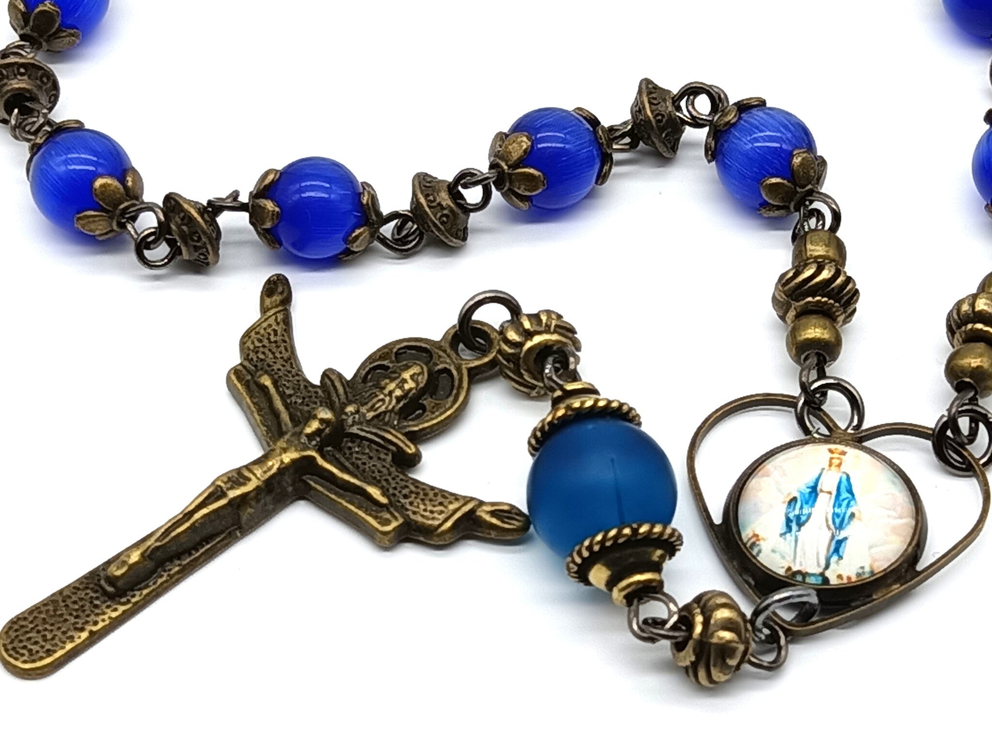 Our Lady of Grace unique rosary beads single decade with blue glass beads and bronze Trinity crucifix, picture medal and small beads.