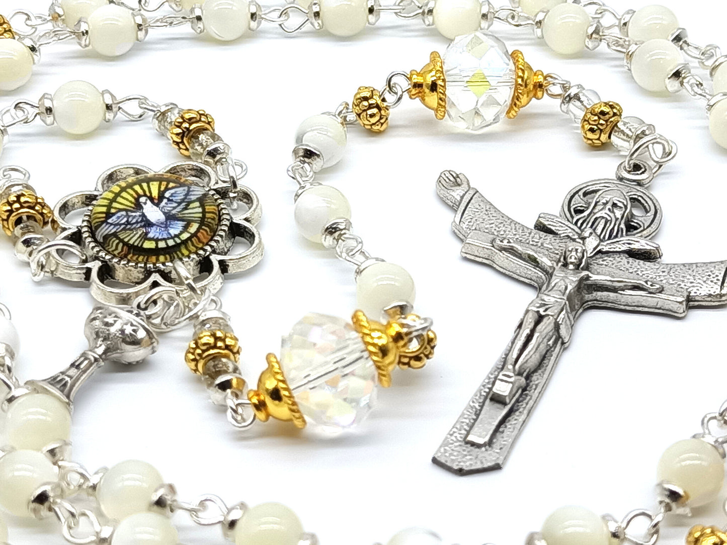 Genuine mother of pearl unique rosary beads with silver crucifix, Holy Spirit  picture centre medal, cut glass pater beads and gold bead caps.