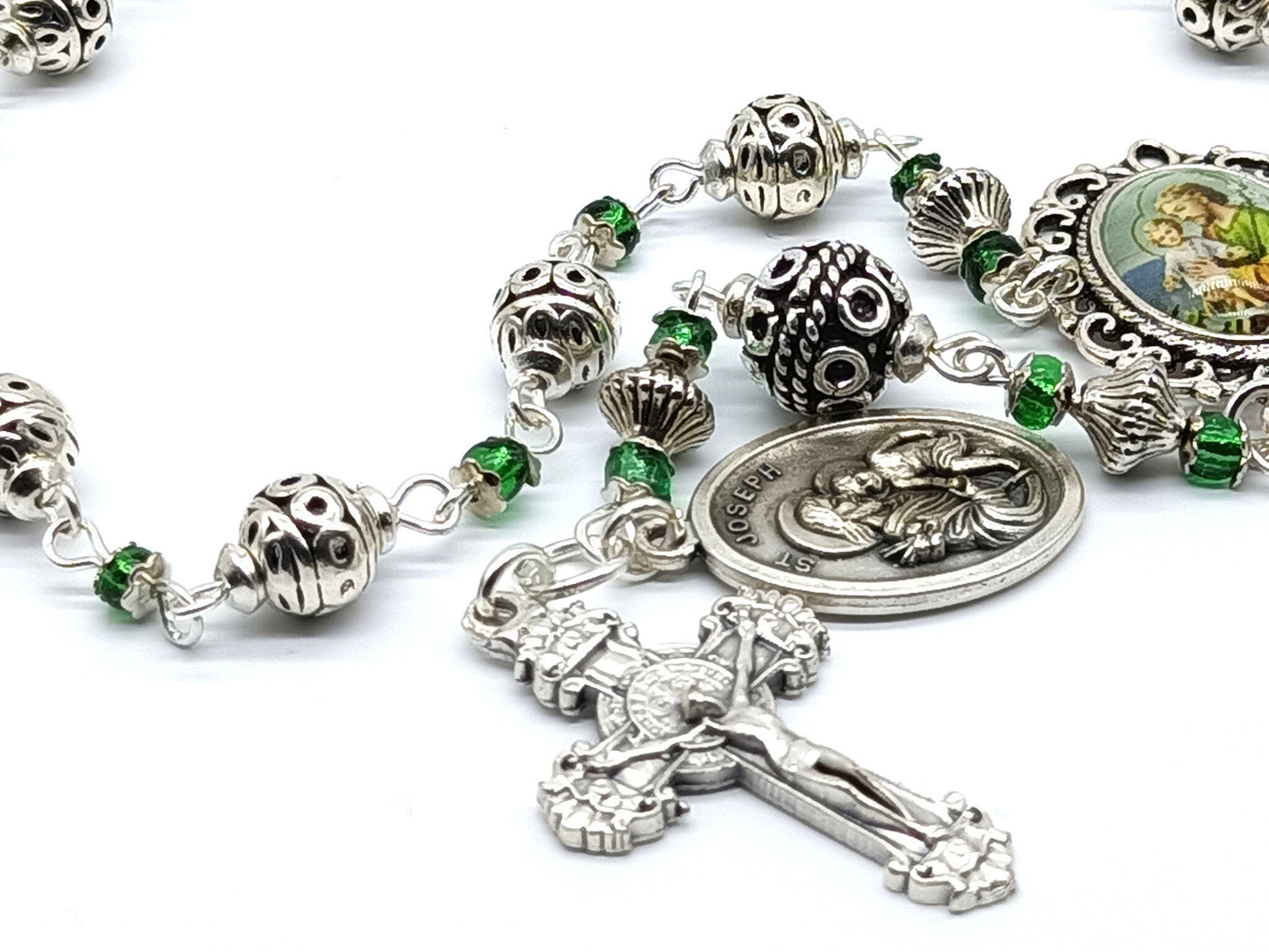 Saint Joseph unique rosary beads single decade with silver and green glass beads, silver crucifix and St. Joseph picture centre medal.