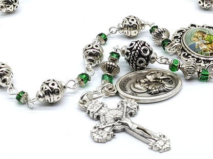 Saint Joseph unique rosary beads single decade with silver and green glass beads, silver crucifix and St. Joseph picture centre medal.