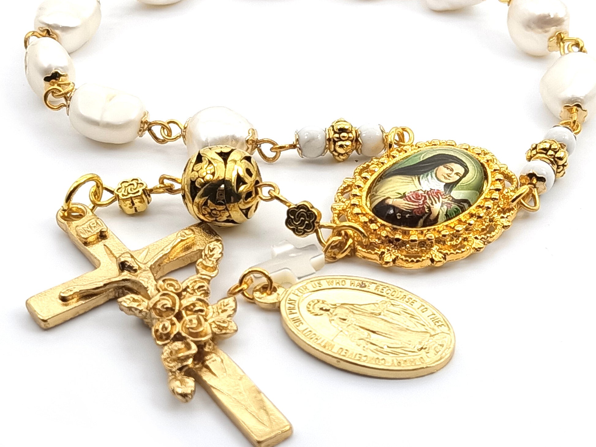 Genuine pearl unique rosary beads single decade with gold crucifix, miraculous medal and Saint Therese of Lisieux picture medal.