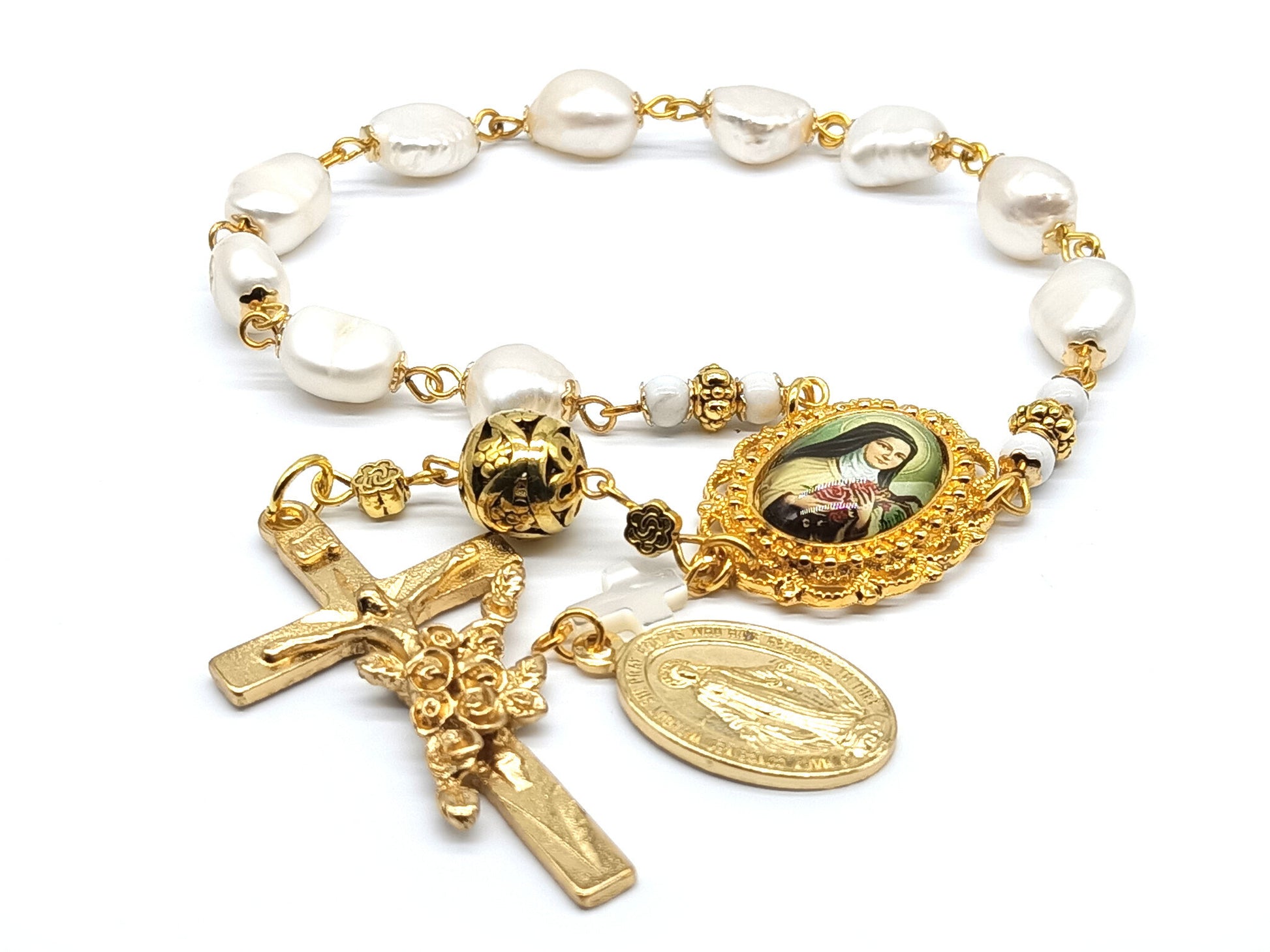 Genuine pearl unique rosary beads single decade with gold crucifix, miraculous medal and Saint Therese of Lisieux picture medal.