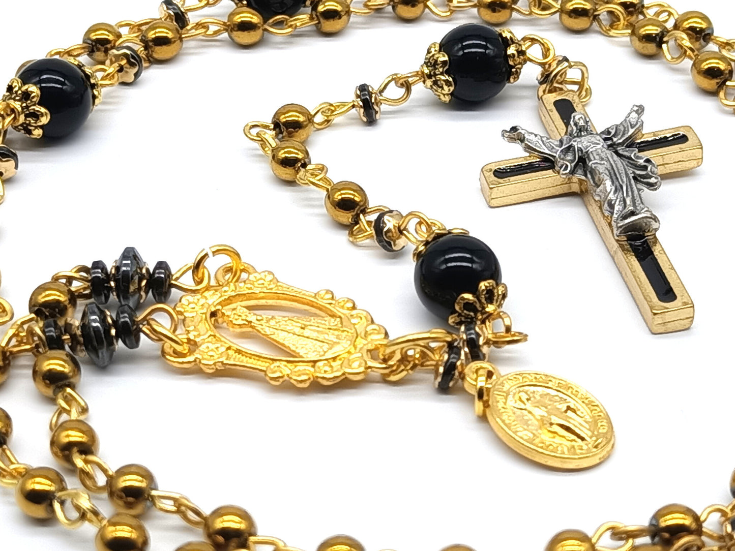 Our lady of Loretto unique rosary beads with gold hematite and onyx gemstone beads, gold and black enamel crucifix, medals and bead caps.