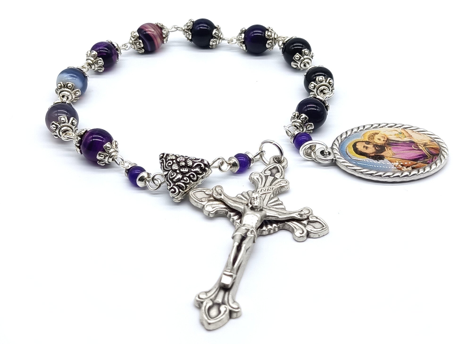 Saint Joseph unique rosary beads single decade with purple gemstone beads, silver crucifix, pater bead and St. Joseph picture centre medal.