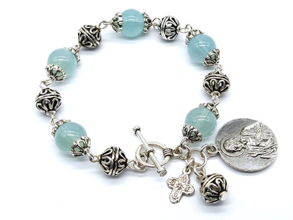 Our Lady of Mount Carmel unique rosary beads single decade bracelet with pale blue glass beads, silver cross, medals and beads.