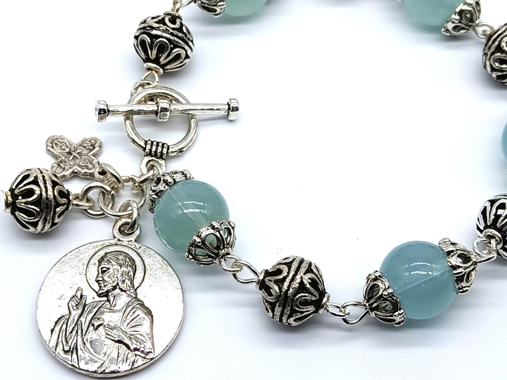 Our Lady of Mount Carmel unique rosary beads single decade bracelet with pale blue glass beads, silver cross, medals and beads.