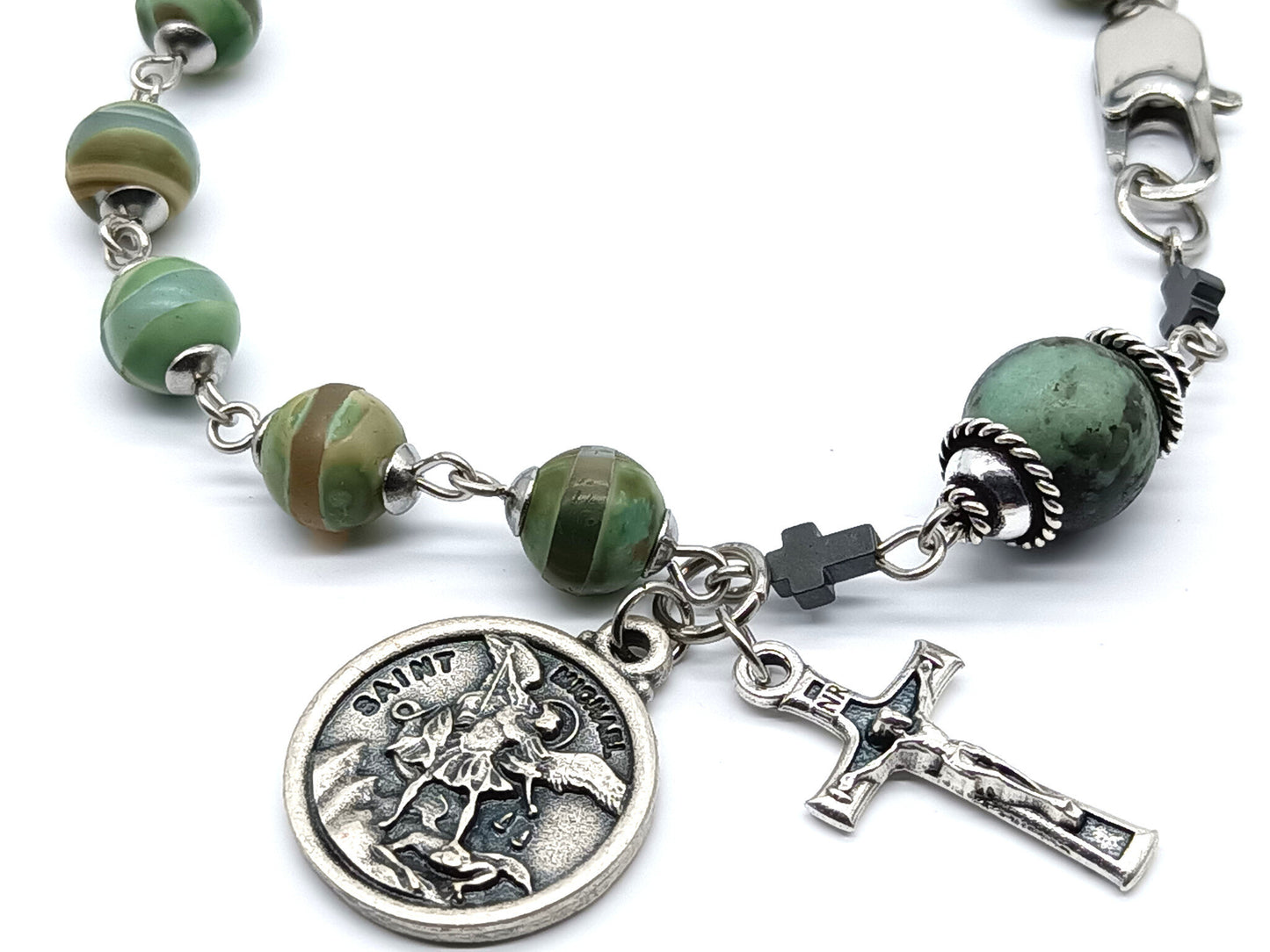 Saint Michael unique rosary beads single decade bracelet with green gemstone beads, silver crucifix, St. Michael medal and lobster clasp.