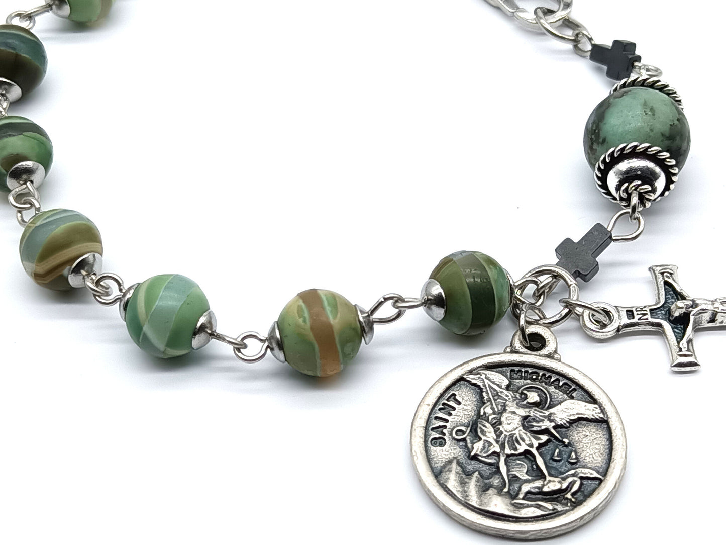 Saint Michael unique rosary beads single decade bracelet with green gemstone beads, silver crucifix, St. Michael medal and lobster clasp.