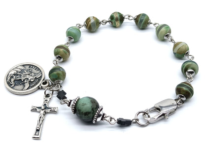 Saint Michael unique rosary beads single decade bracelet with green gemstone beads, silver crucifix, St. Michael medal and lobster clasp.