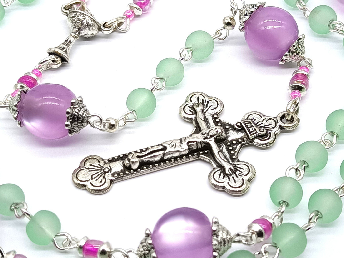 First Holy Communion unique rosary beads with green and purple glass beads, silver crucifix and chalice centre medal.