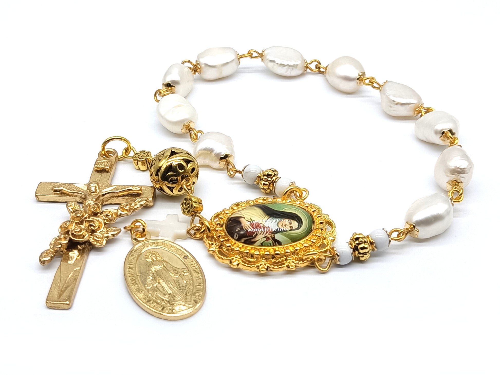 Genuine pearl unique rosary beads single decade with gold crucifix, miraculous medal and Saint Therese of Lisieux picture medal.