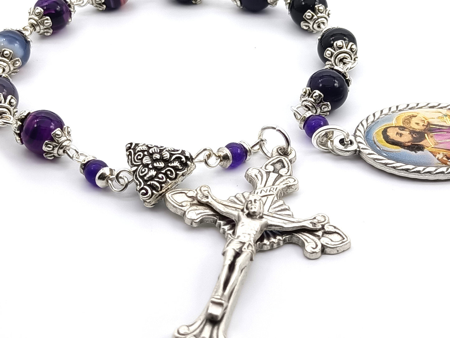 Saint Joseph unique rosary beads single decade with purple gemstone beads, silver crucifix, pater bead and St. Joseph picture centre medal.
