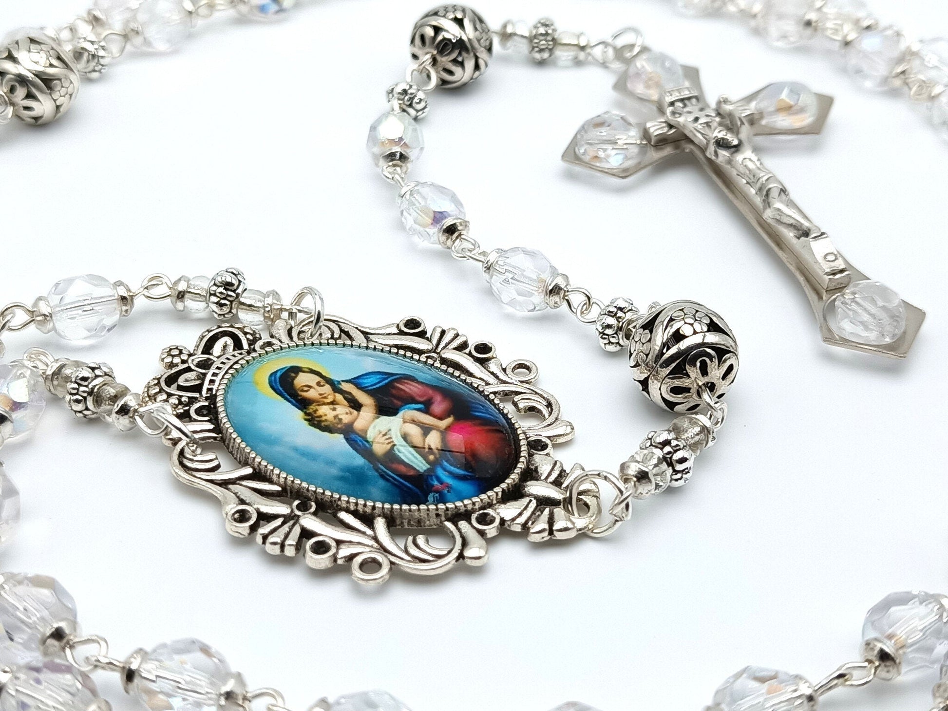 Virgin Mary and Child unique rosary beads with clear crystal and silver beads, silver and crystal crucifix and silver picture centre medal.