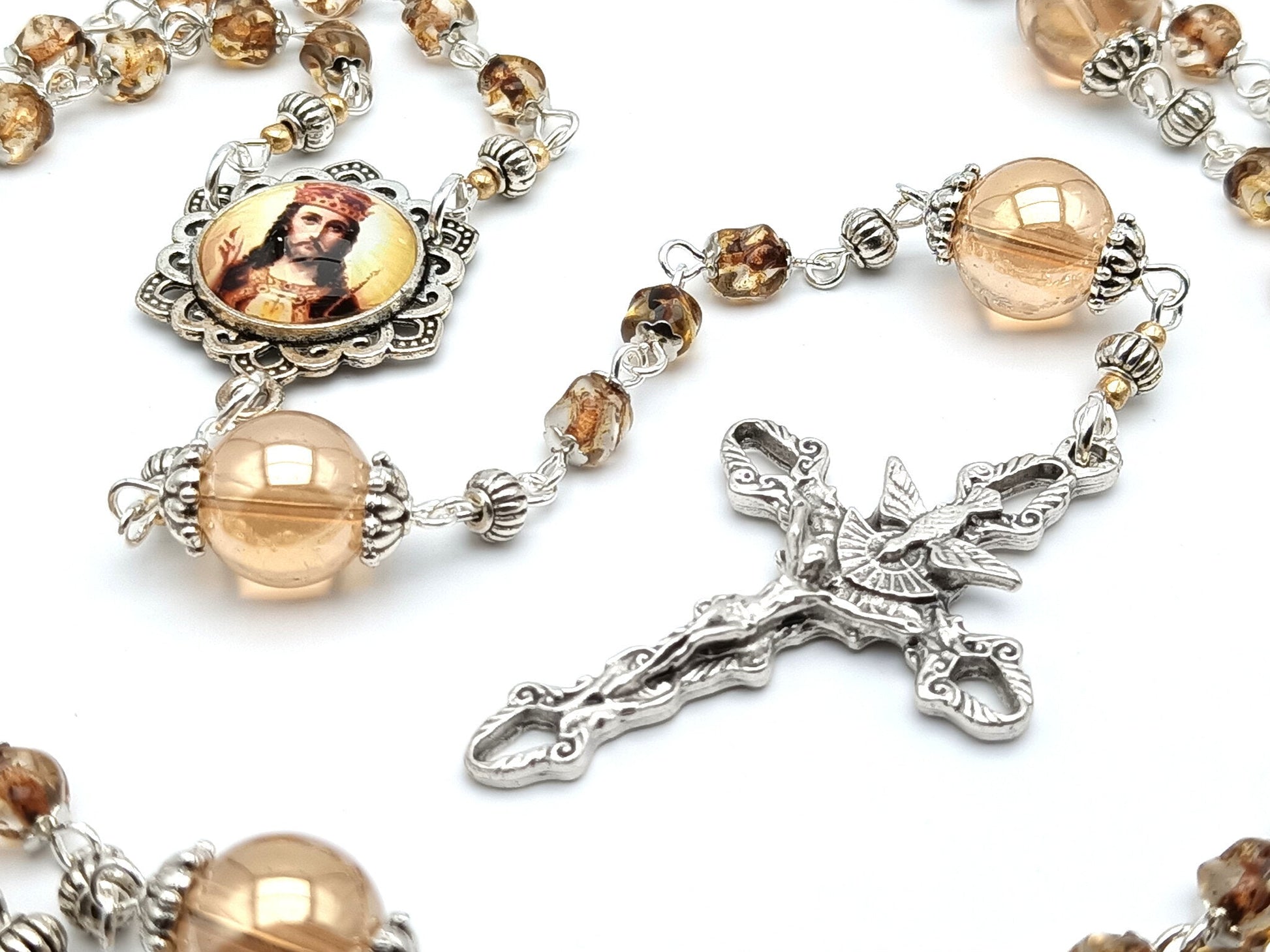 Christ the King unique rosary beads with nugget amber glass beads, silver Holy Spirit crucifix and picture centre medal.