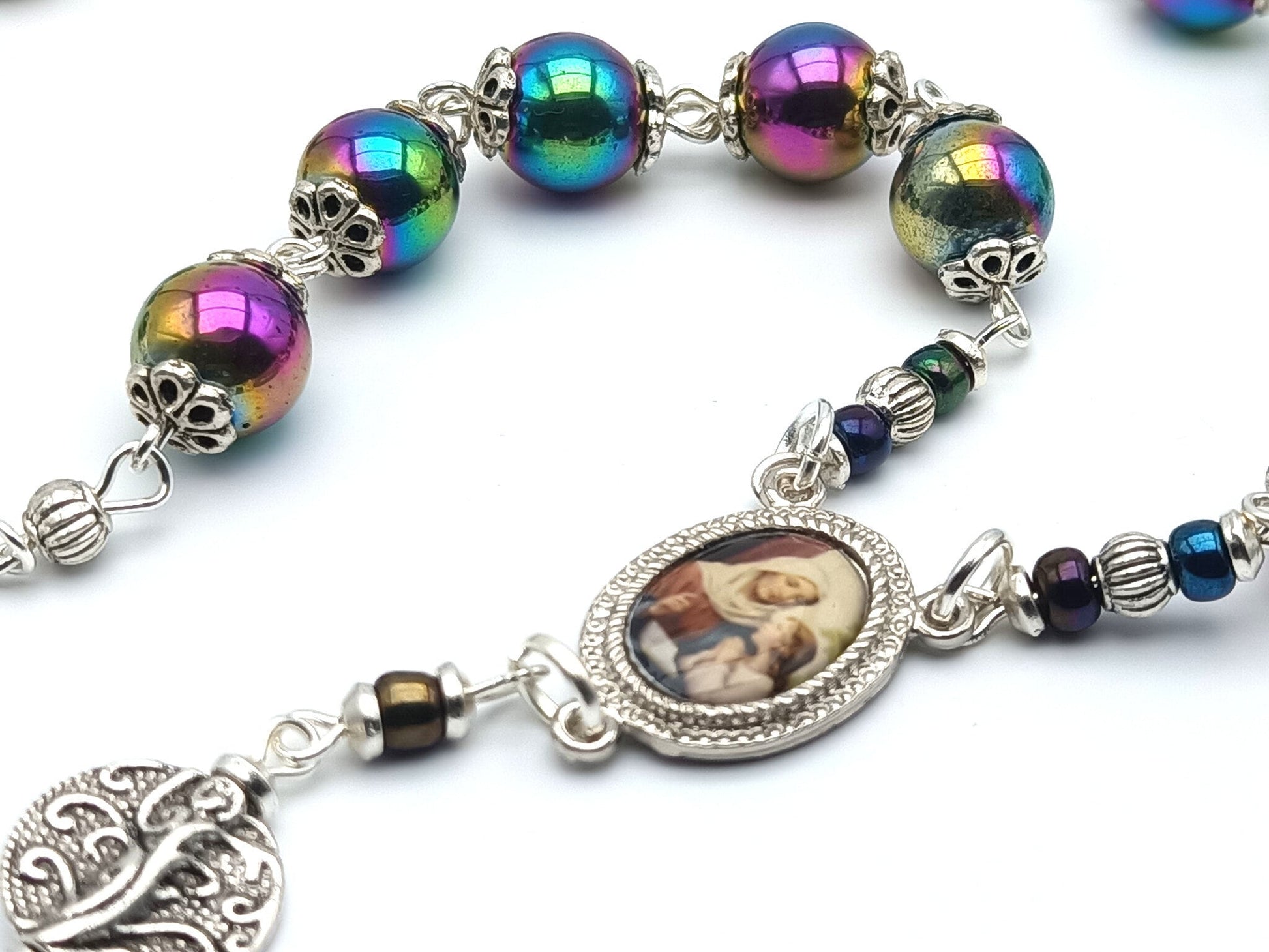 Saint Ann unique rosary beads prayer chaplet, with petrol coloured beads, silver picture centre medal, bead caps and Saint Ann medal.