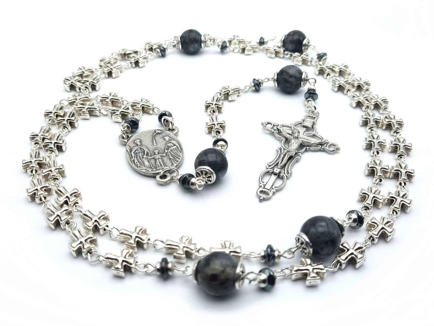 Three hearts of Jesus, Mary and Joseph unique rosary beads with metal cross beads, dark grey gemstone pater beads, silver bead caps, crucifix and centre medal.