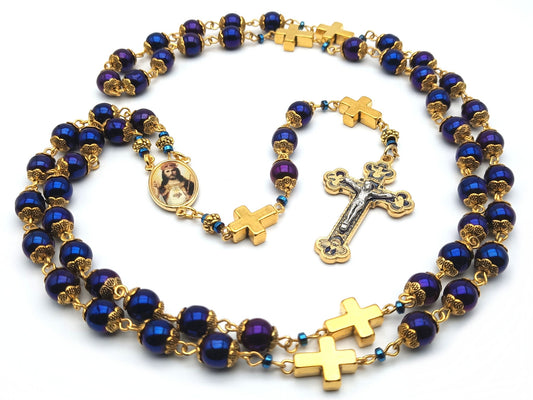 Christ the King unique rosary beads with blue hematite beads, golden cross pater beads, blue and gold crucifix and picture centre medal.
