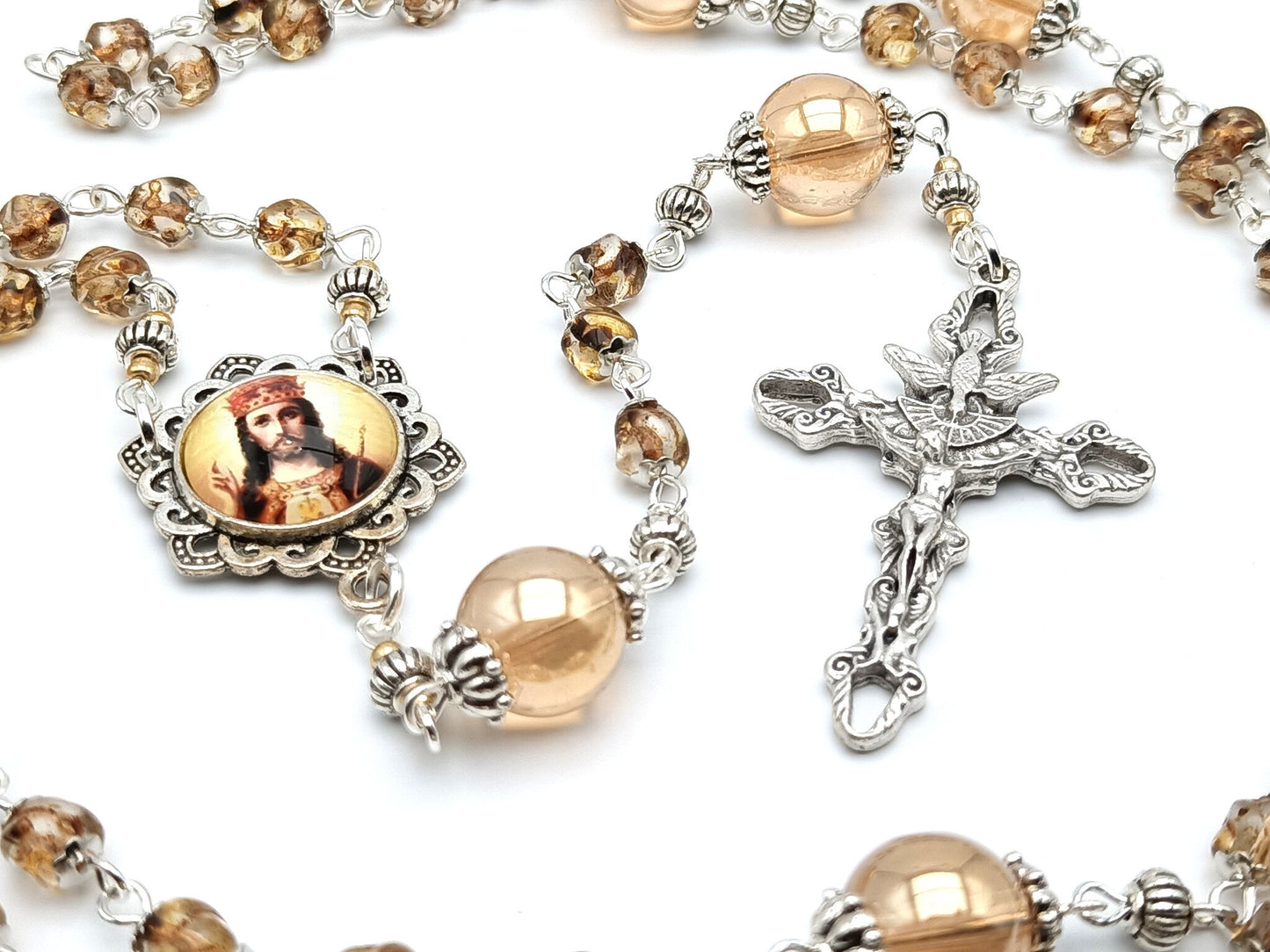 Christ the King unique rosary beads with nugget amber glass beads, silver Holy Spirit crucifix and picture centre medal.