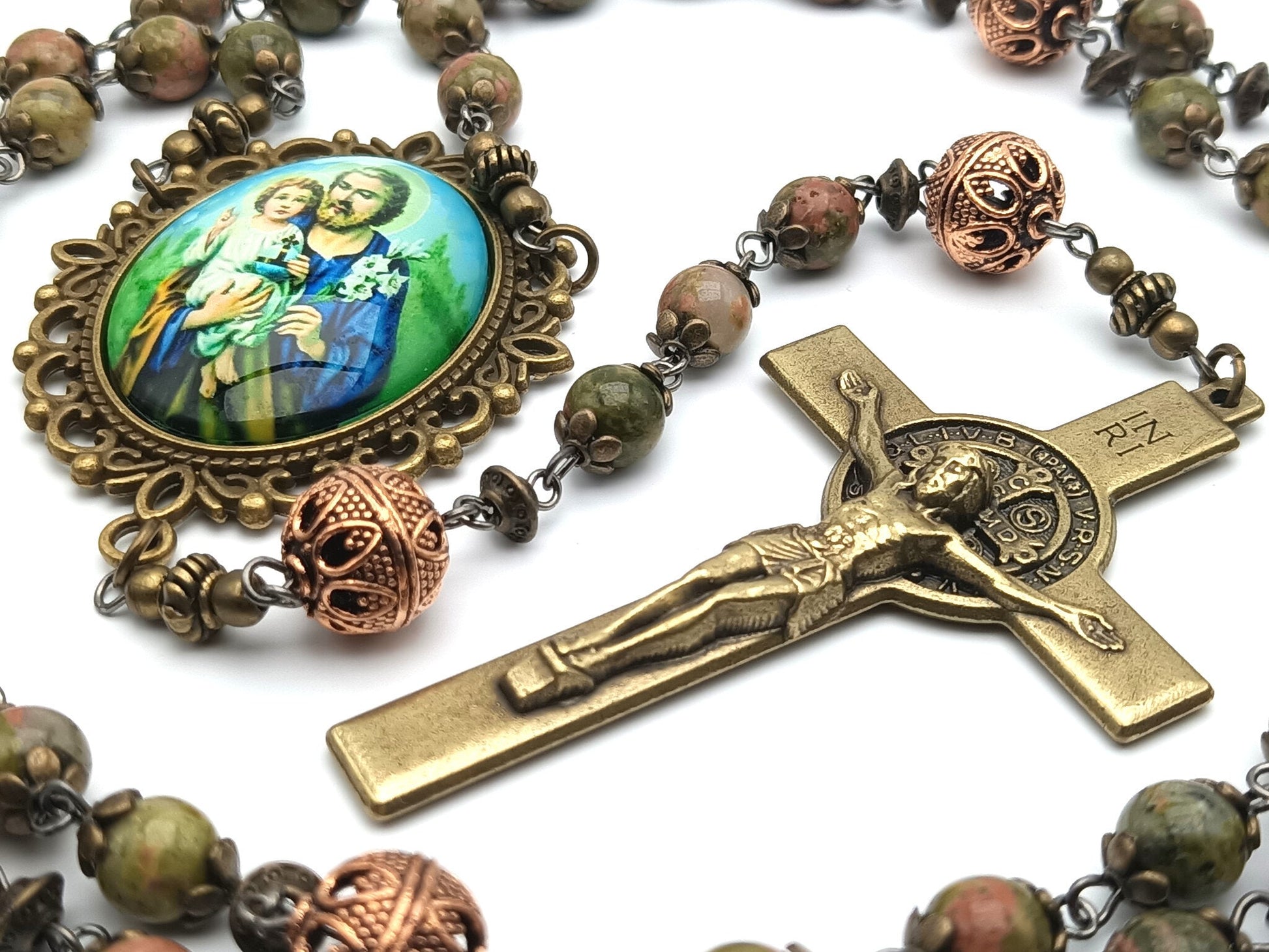 Saint Joseph unique rosary beads with green gemstone beads, bronze bead caps, copper pater beads, brass Saint Benedict crucifix and picture centre medal.