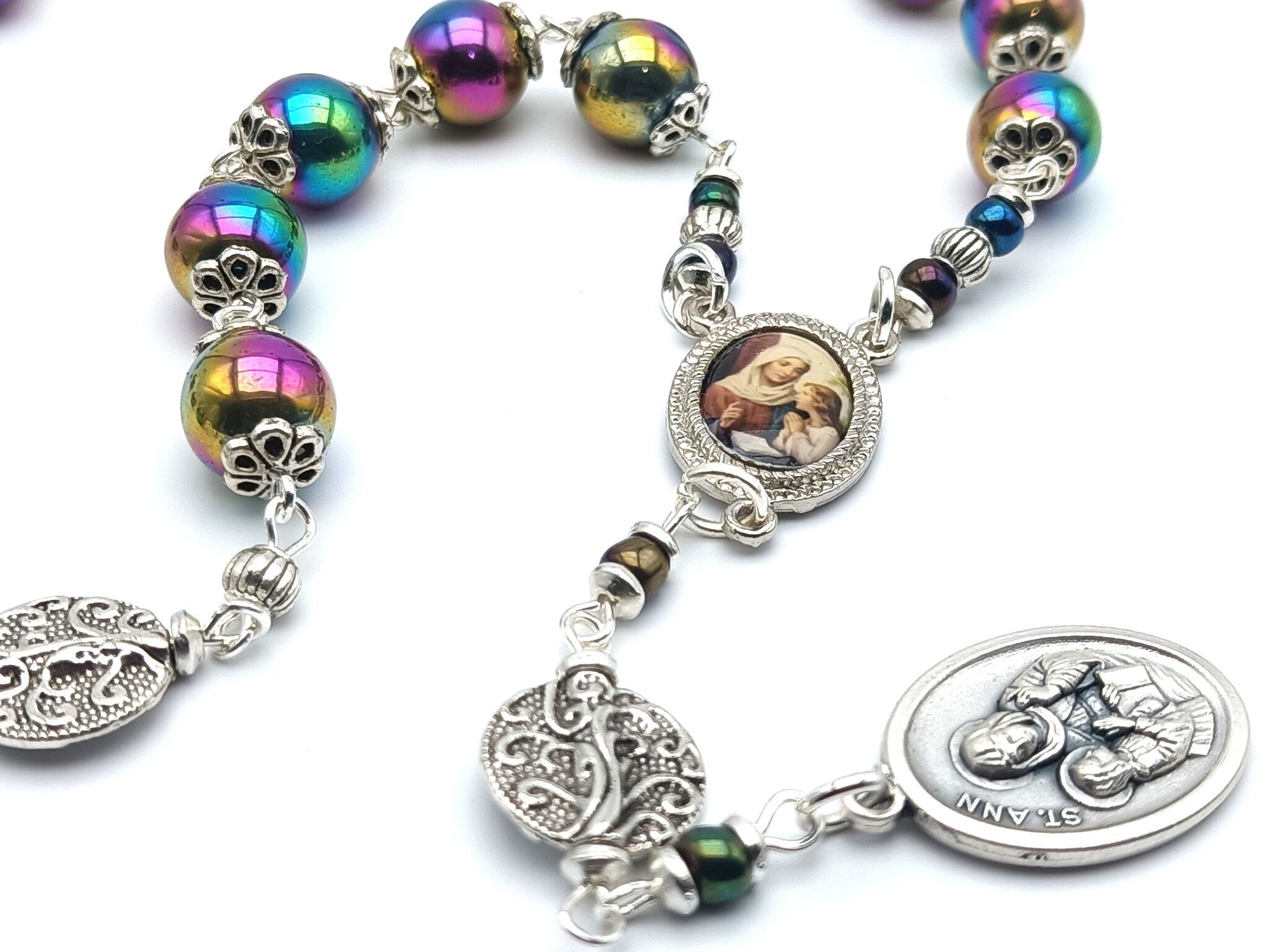 Saint Ann unique rosary beads prayer chaplet, with petrol coloured beads, silver picture centre medal, bead caps and Saint Ann medal.