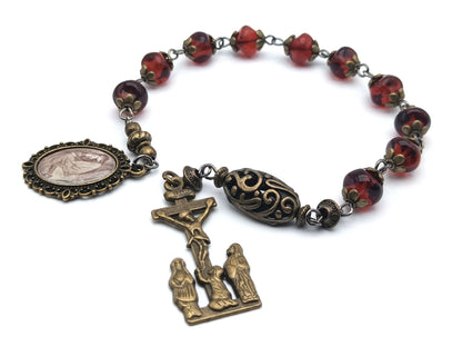 Saint Mary Magdalene unique rosary beads single decade or tenner rosary with red nugget glass beads, bronze bead caps, two Marys crucifix and picture medal.