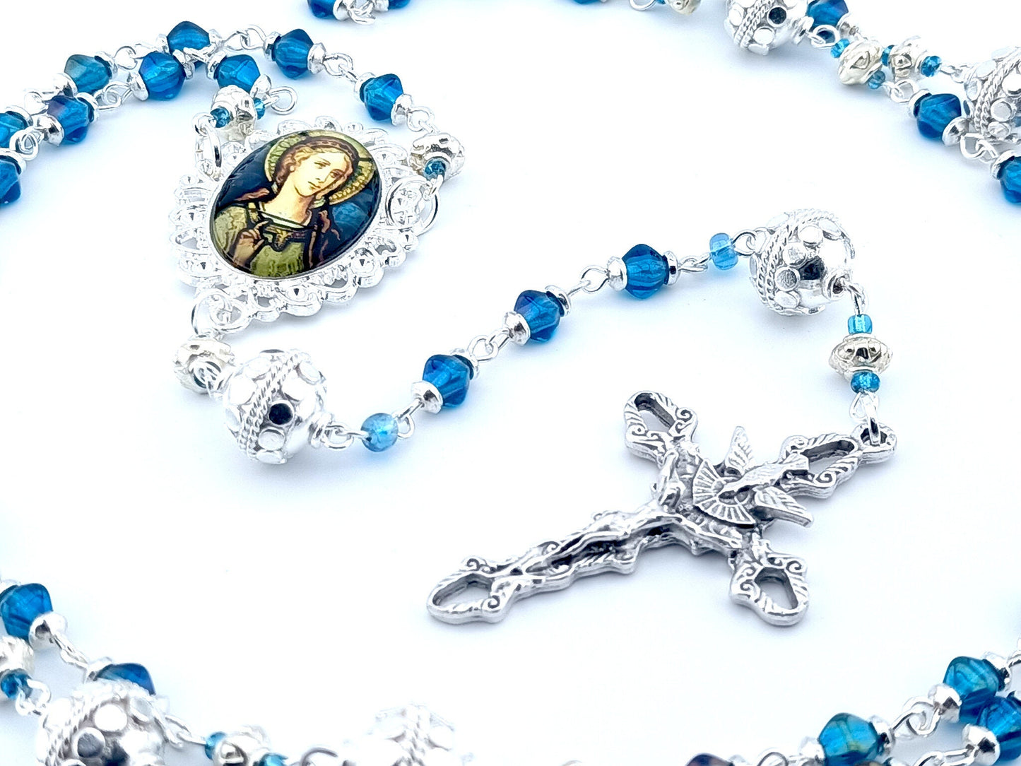 Angel Gabriel unique rosary beads with blue glass beads, silver pater beads, Holy Spirit crucifix and picture centre medal.