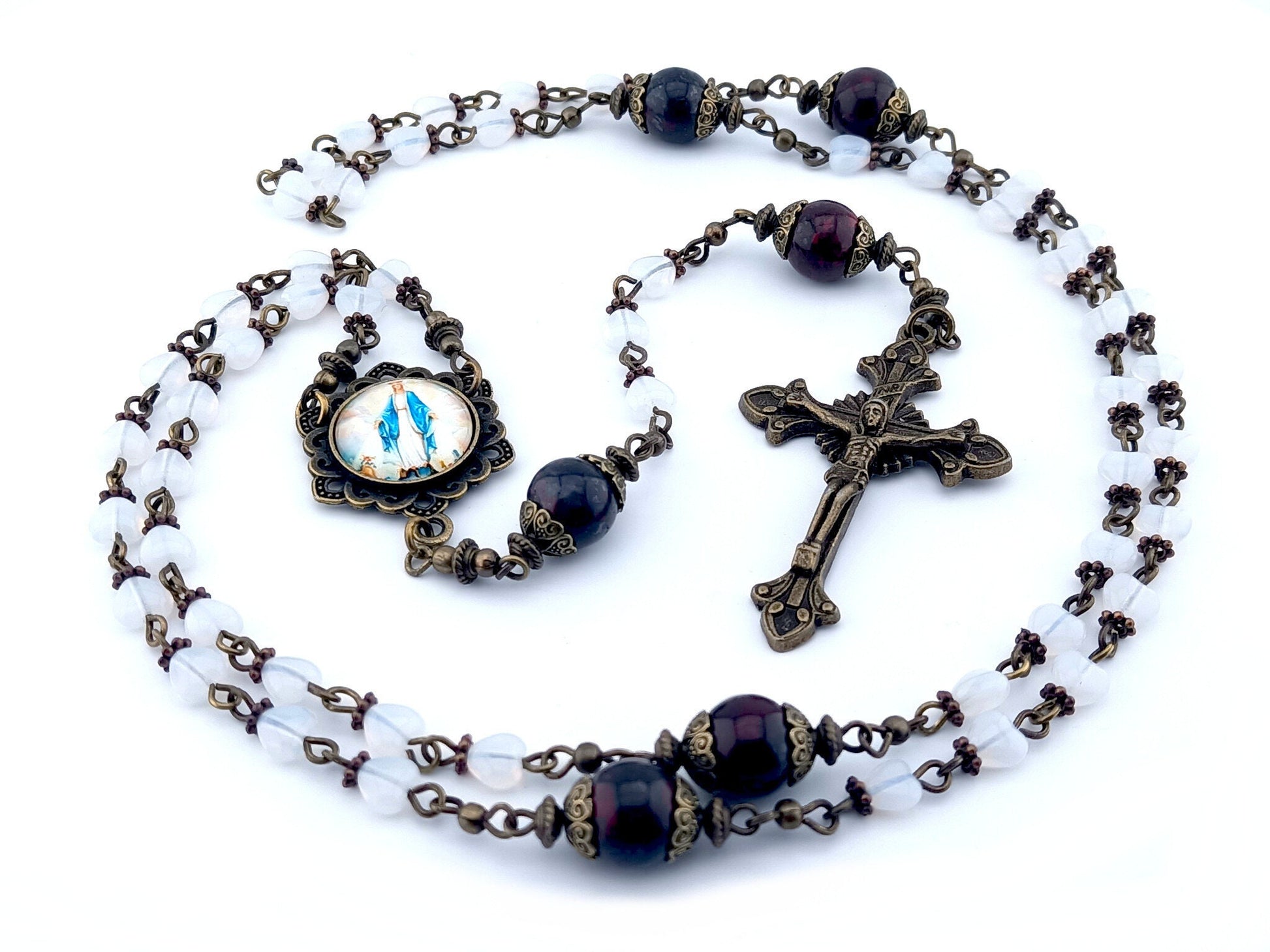 Our Lady of Grace unique rosary beads with white heart glass beads, deep red jade gemstone pater beads, bronze crucifix, picture centre medal and bead caps.