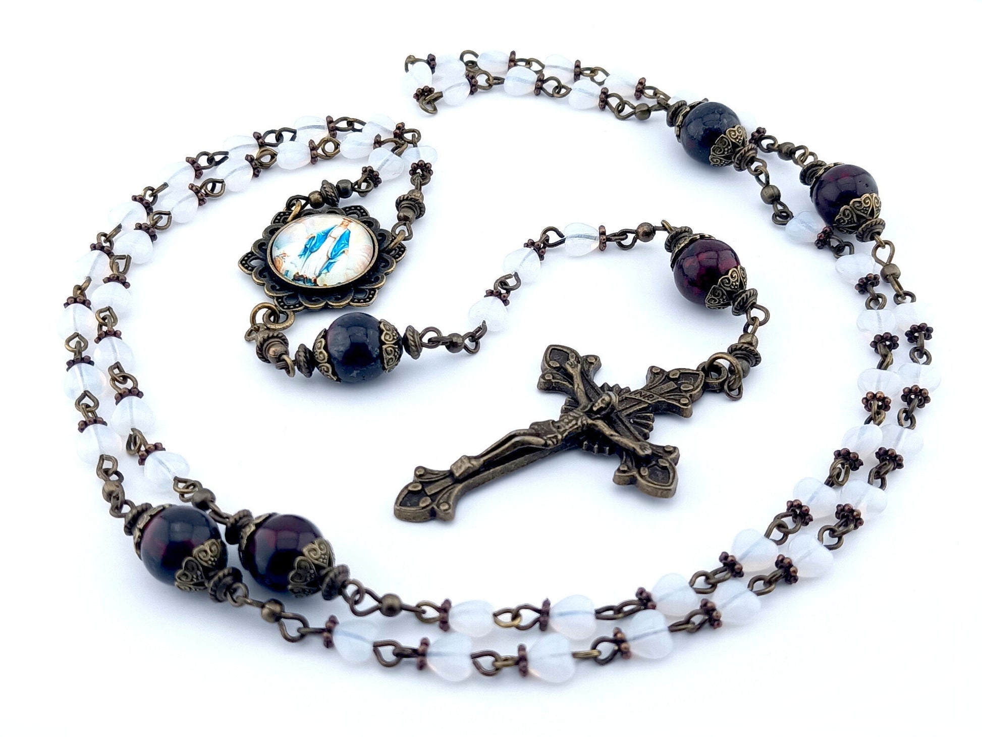 Our Lady of Grace unique rosary beads with white heart glass beads, deep red jade gemstone pater beads, bronze crucifix, picture centre medal and bead caps.