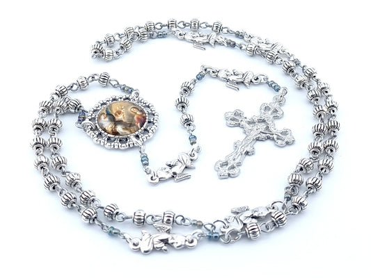 The Annunciation unique rosary beads with Tibetan silver beads, silver angel pater beads, crucifix and picture centre medal.