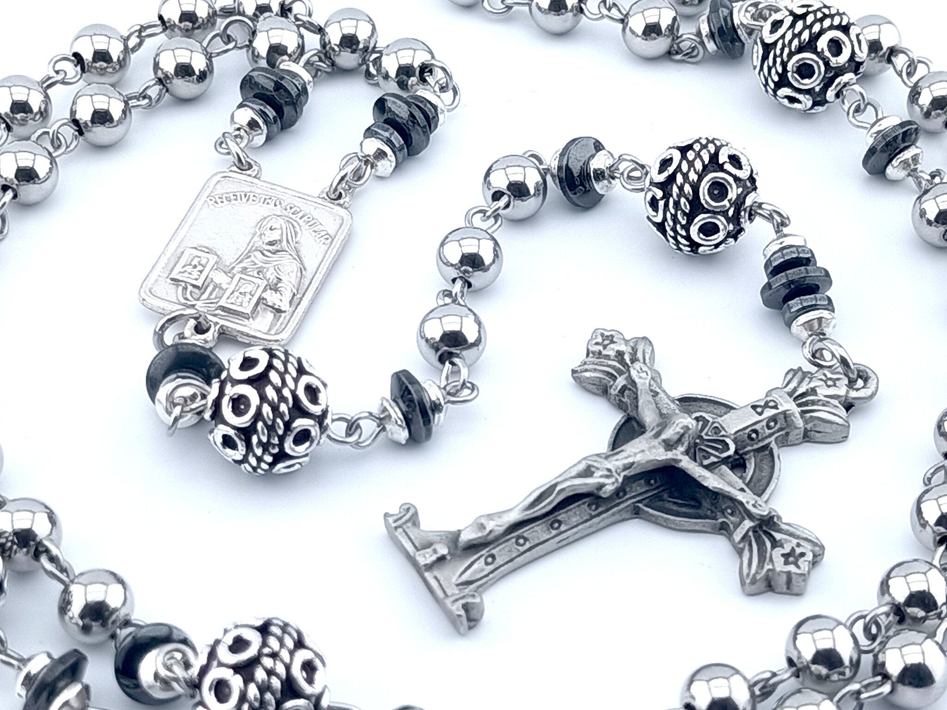 Brown Scapular unique rosary beads with stainless steel beads, pewter crucifix, silver pater beads and centre medal.