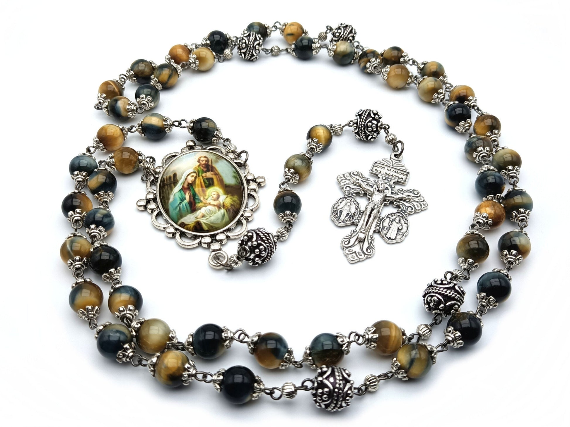 The Holy family unique rosary beads with tigers eye gemstone beads, silver pater beads, pardon crucifix and picture centre medal.