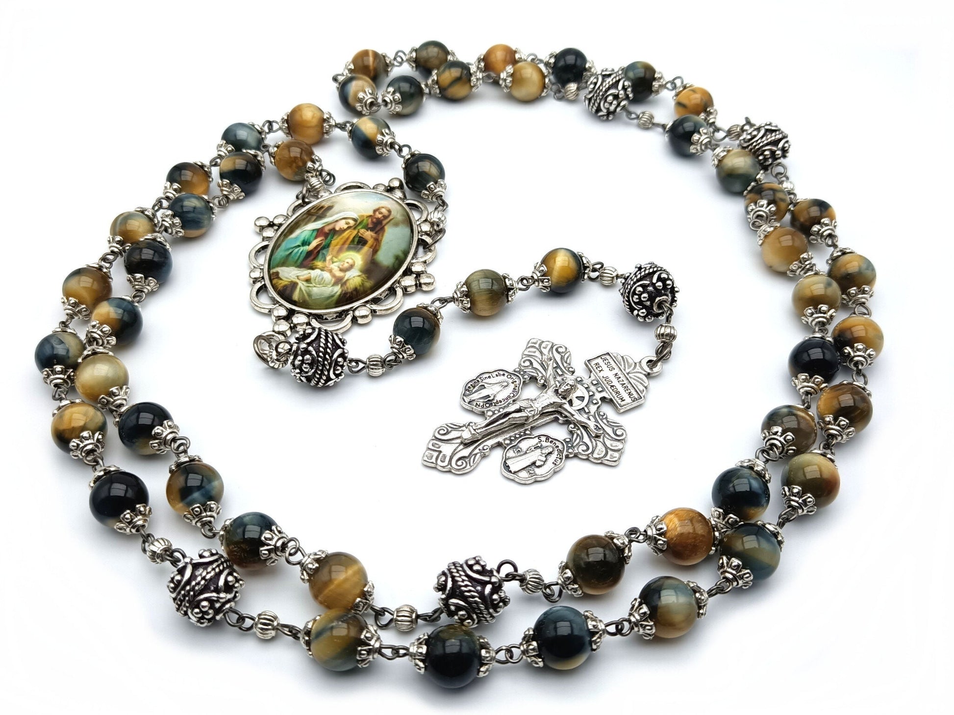 The Holy family unique rosary beads with tigers eye gemstone beads, silver pater beads, pardon crucifix and picture centre medal.