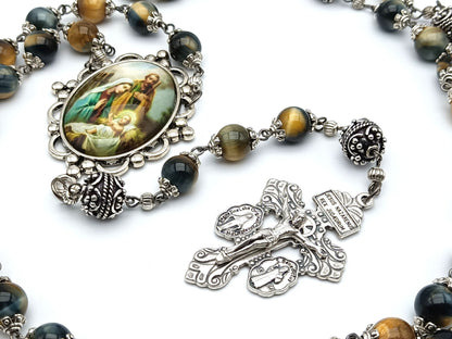 The Holy family unique rosary beads with tigers eye gemstone beads, silver pater beads, pardon crucifix and picture centre medal.