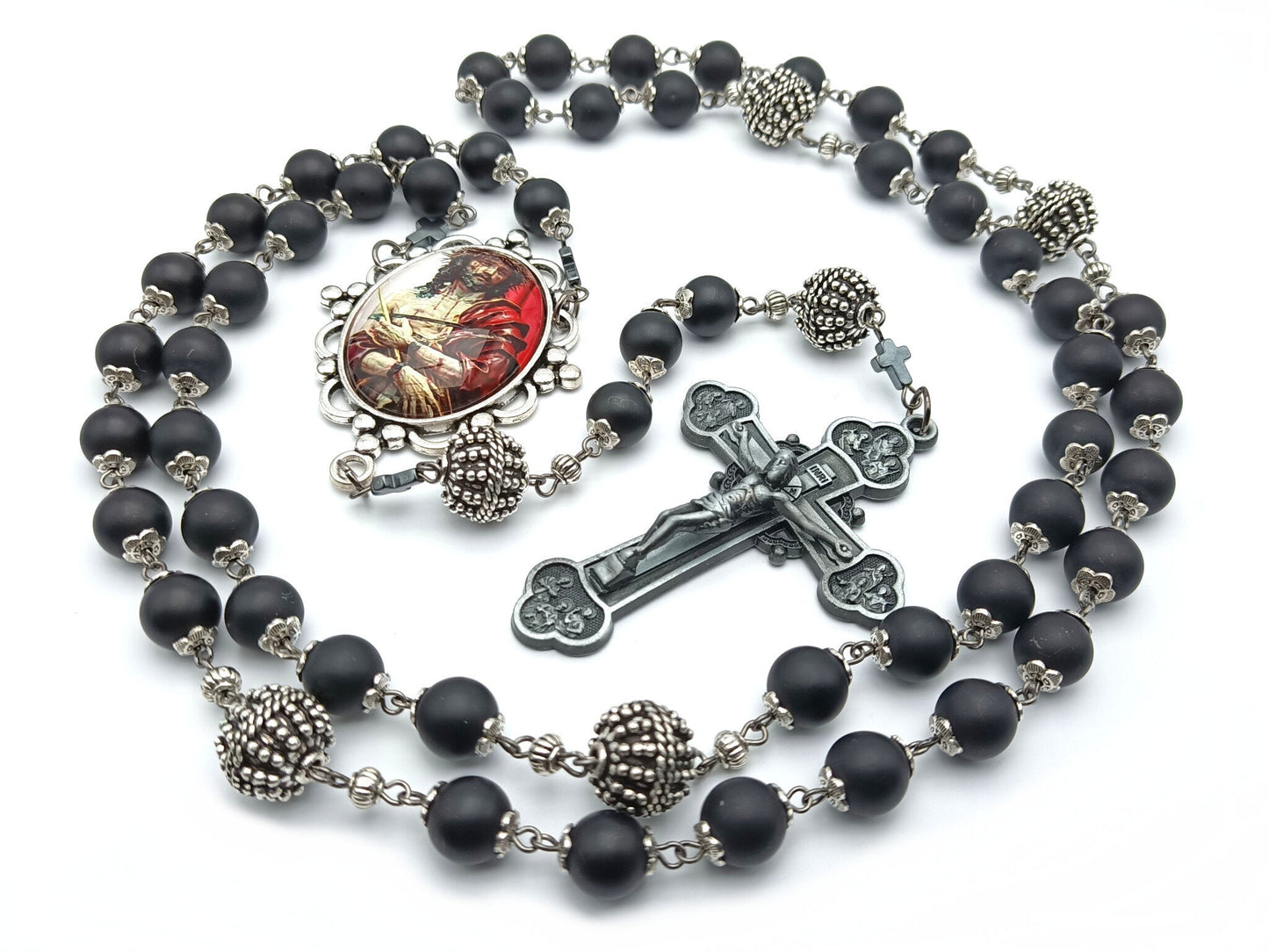 The Crucifixion unique rosary beads with onyx beads, silver pater beads, pewter twelve Apostles crucifix and picture centre medal.