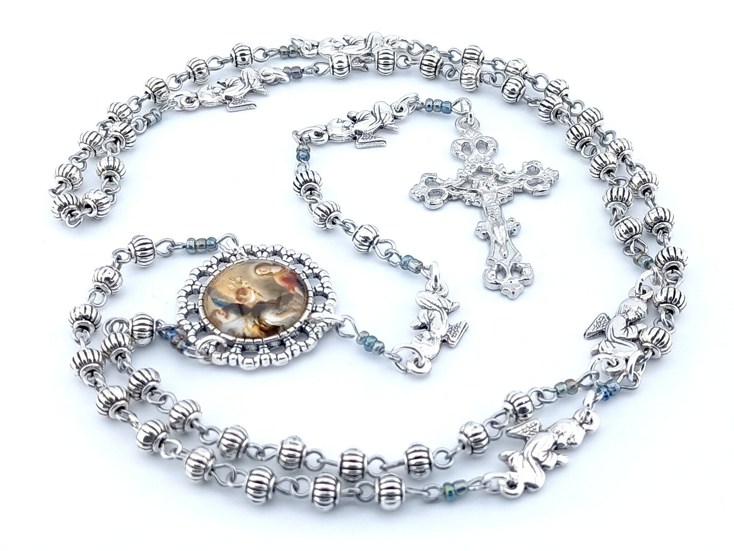 The Annunciation unique rosary beads with Tibetan silver beads, silver angel pater beads, crucifix and picture centre medal.