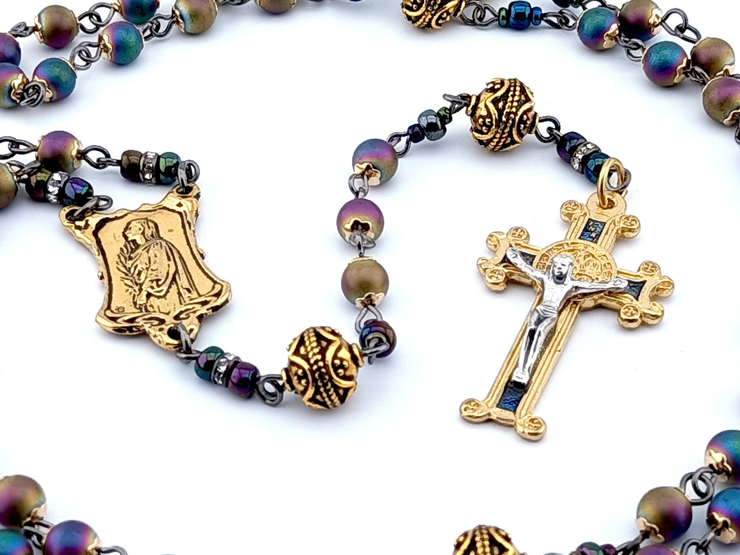 Saint Philomena and Saint John Vianney unique rosary beads with antique style petrol hematite beads, golden pater beads, crucifix and double sided centre medal.