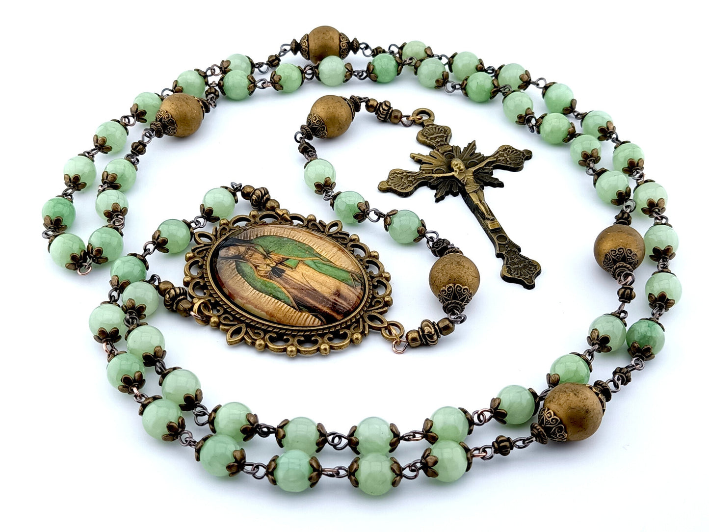 Our Lady of Guadalupe unique rosary beads with jade and gold glass beads, bronze crucifix and centre picture medal and bead caps.