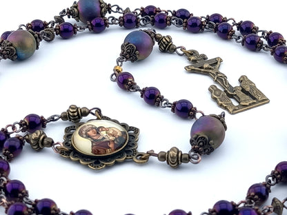 Our Lady of Perpetual Help unique rosary beads with purple hematite beads, bronze two Marys crucifix, picture centre medal and bead caps.