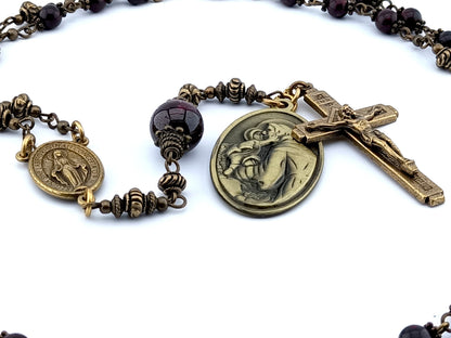 Saint Anthony unique rosary beads prayer chaplet with dark red gemstone beads, bronze crucifix, centre miraculous medal and Saint Christopher medal.