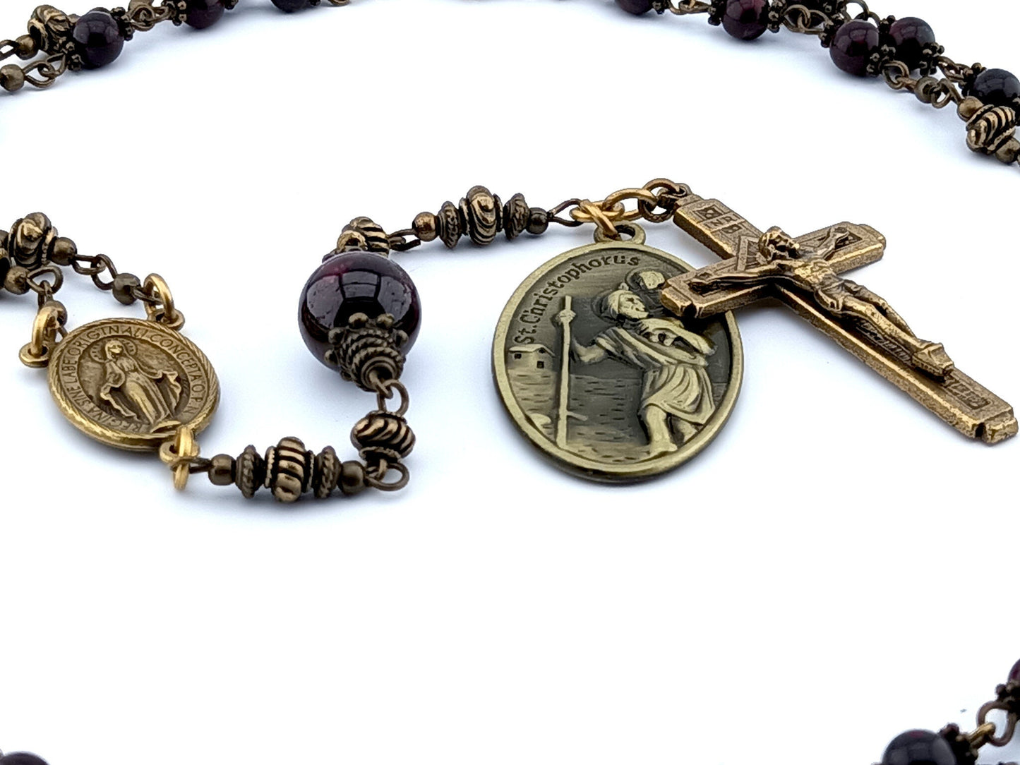 Saint Anthony unique rosary beads prayer chaplet with dark red gemstone beads, bronze crucifix, centre miraculous medal and Saint Christopher medal.