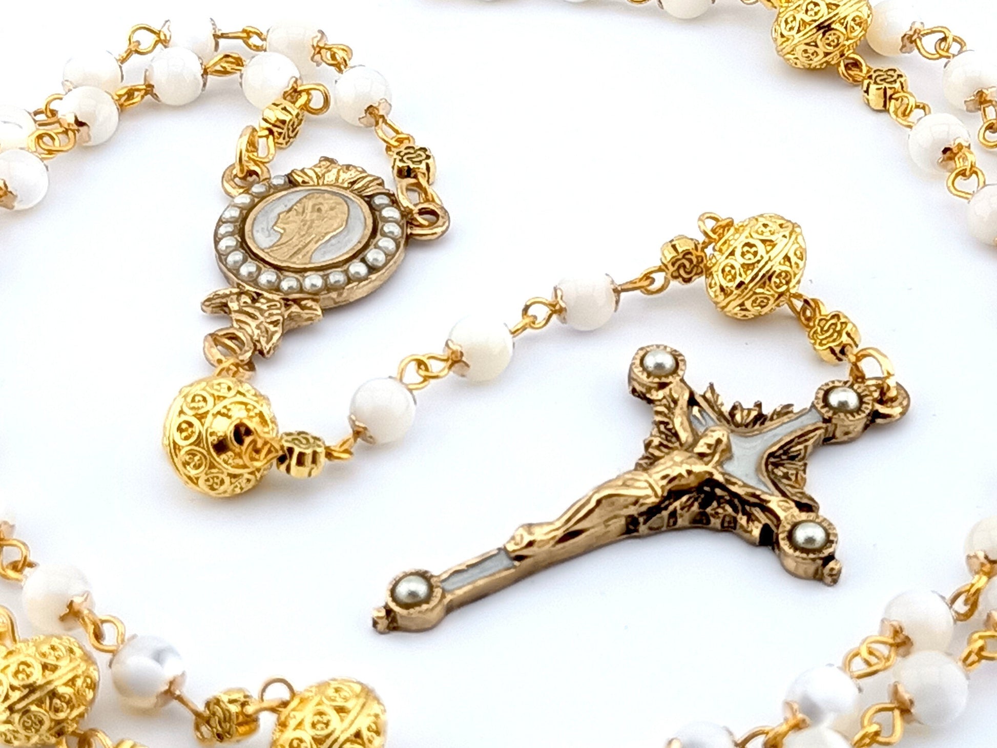 Our Lady of Grace unique rosary beads with mother of pearl beads, golden crucifix, pater beads and centre medal.