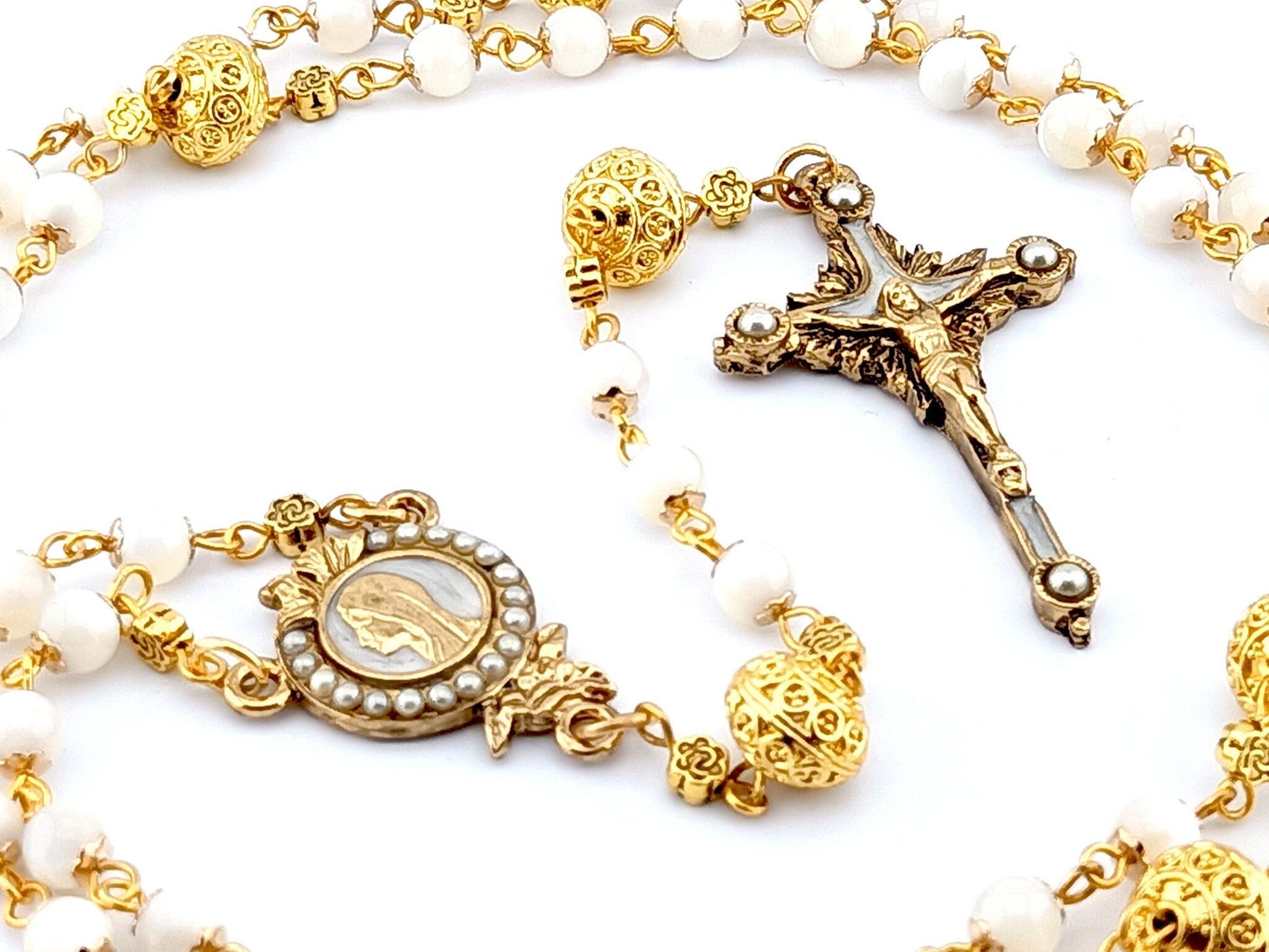 Our Lady of Grace unique rosary beads with mother of pearl beads, golden crucifix, pater beads and centre medal.