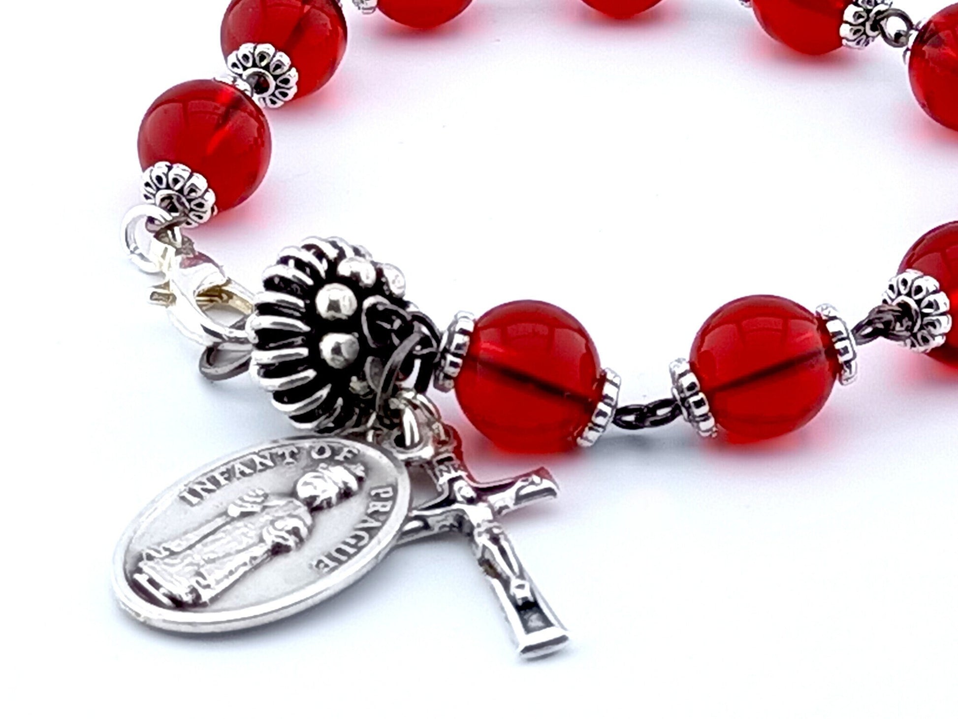 Infant of Prague unique rosary beads single decade bracelet with red glass beads, silver pater bead, crucifix and medal.