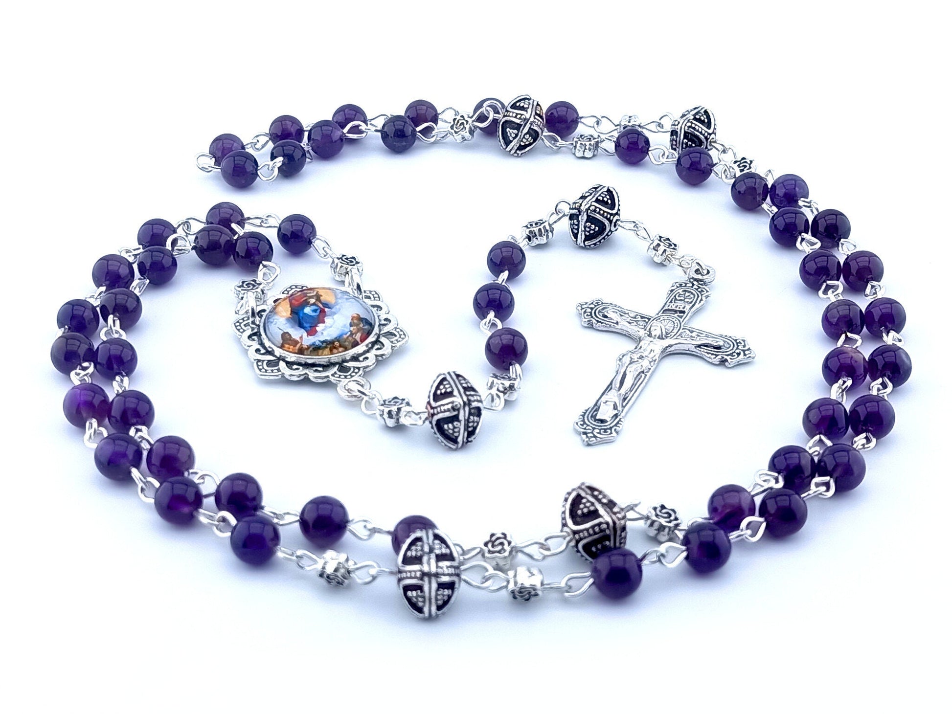 Our Lady Queen of Heaven unique rosary beads with purple amethyst gemstone beads, silver crucifix, picture centre medal, pater beads and linking beads.