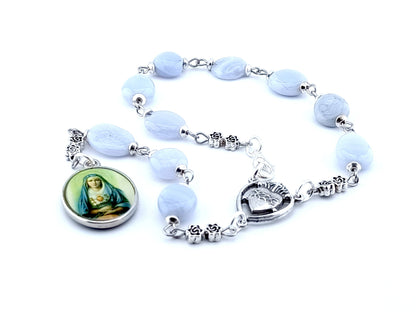 Our Lady of Sorrows unique rosary beads prayer chaplet with blue agate beads, silver Sacred Heart centre medal and picture end medal.
