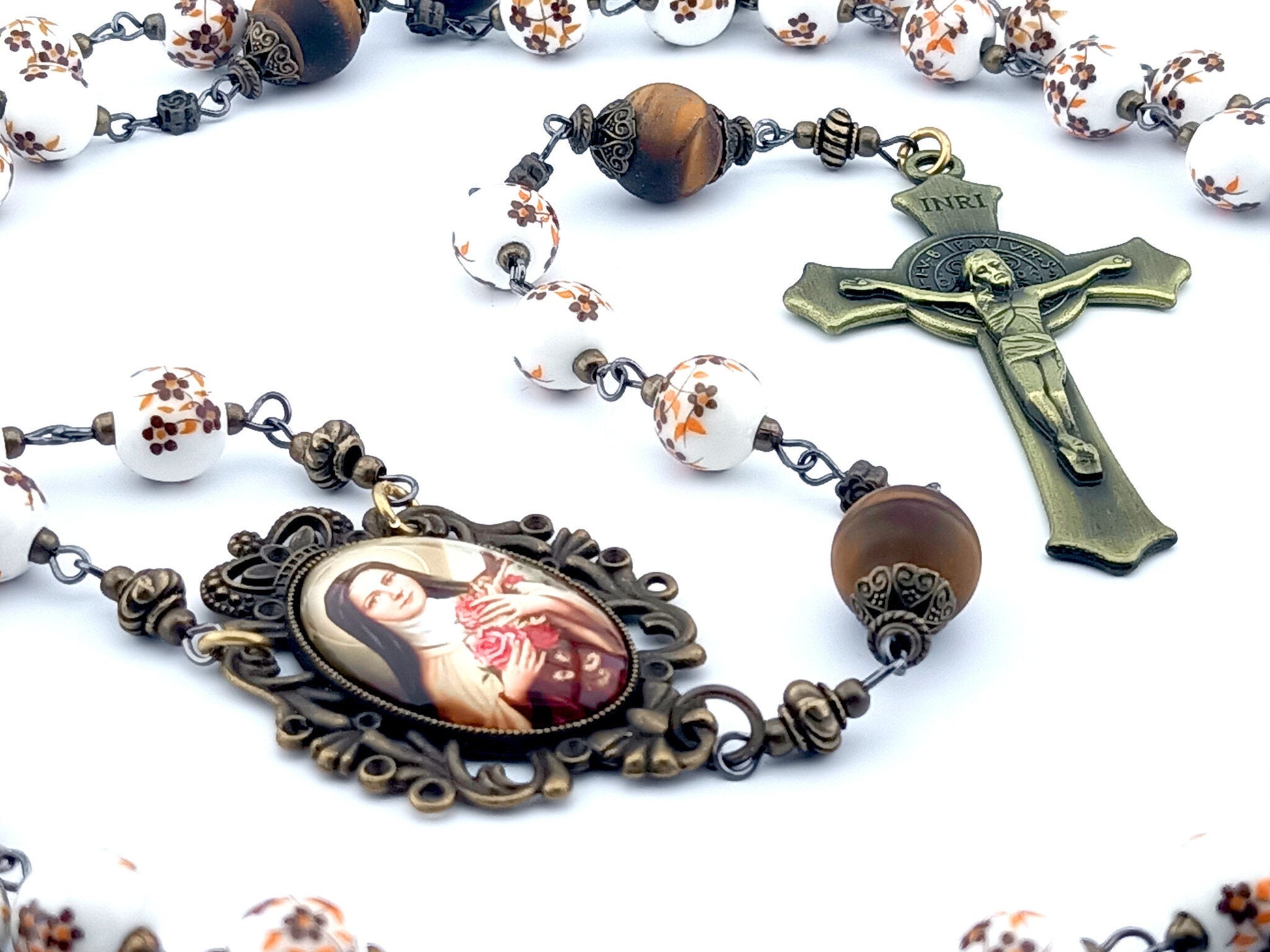 Saint Therese of Lisieux unique rosary beads with porcelain and tigers eye beads, bronze crucifix and picture centre medal.