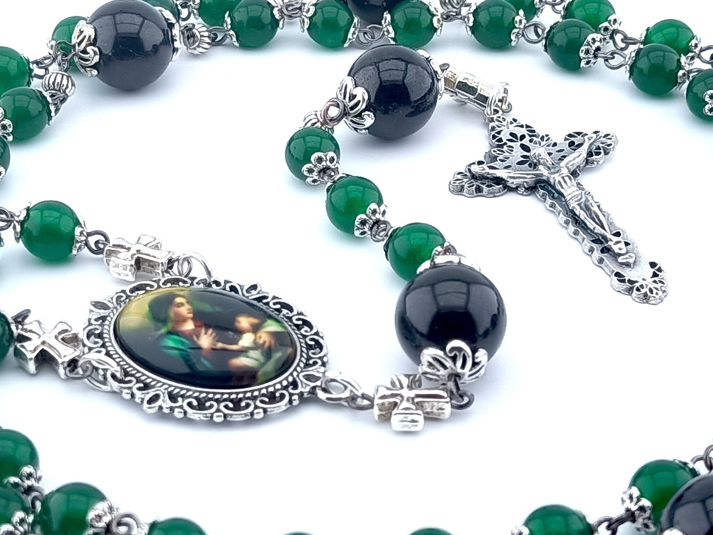 The Nativity unique rosary beads with green jasper gemstone beads, silver crucifix and picture centre medal, large garnet pater beads and silver bead caps and cross linking beads.