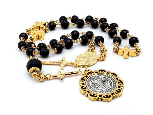Saint Benedict unique rosary beads prayer chaplet with black and gold beads, medals and linking crucifixes.