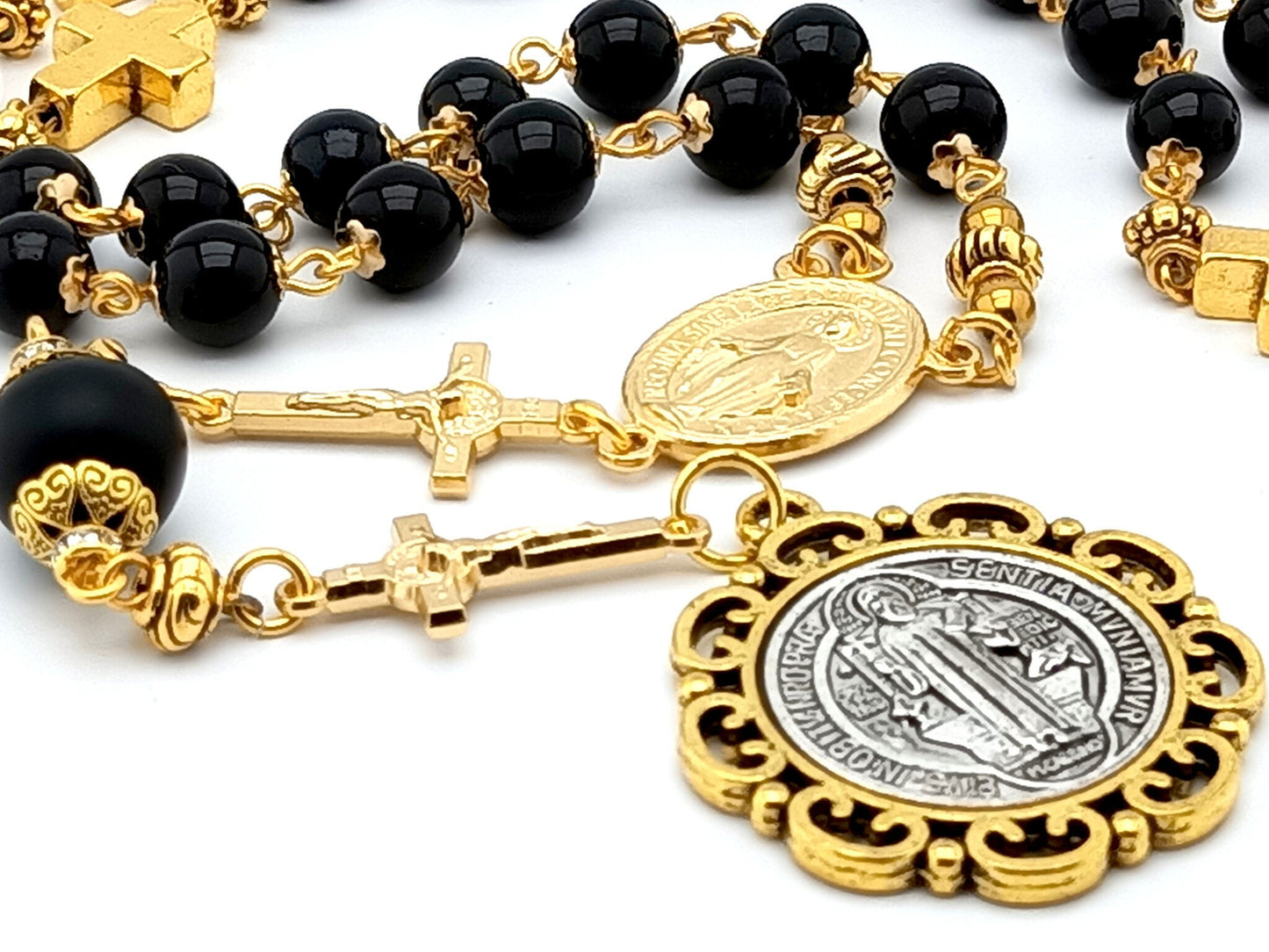Saint Benedict unique rosary beads prayer chaplet with black and gold beads, medals and linking crucifixes.