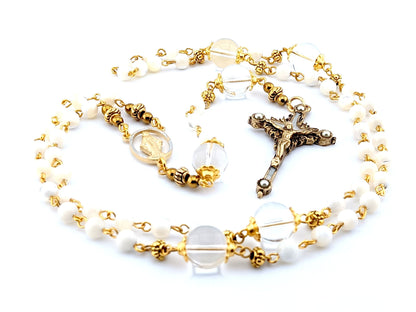 Miraculous Medal unique rosary beads with mother of pearl and glass beads, pewter crucifix and golden linking beads.